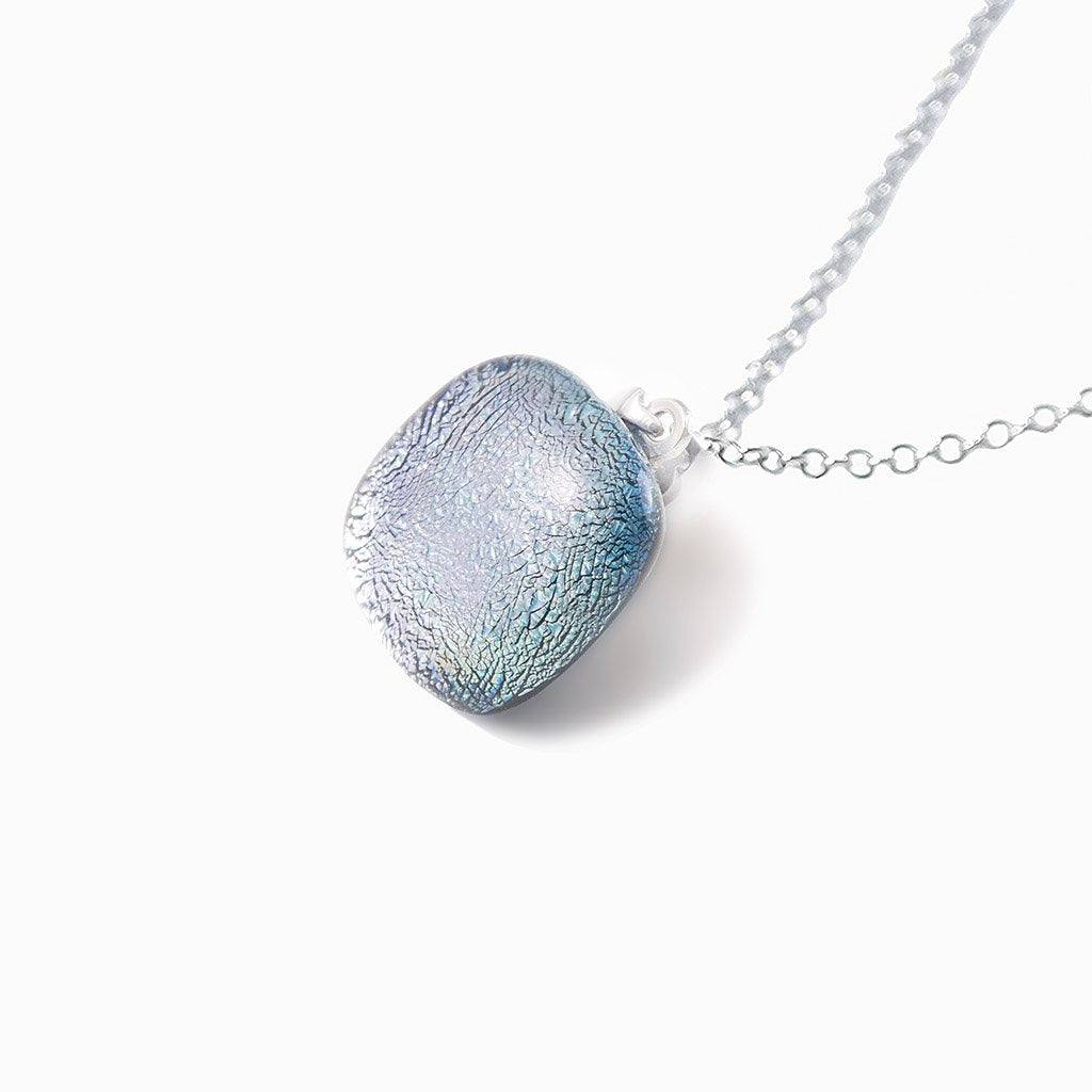 NECKLACE SILVER PEARL ~ AQUA | SQUIRCLE | REFLET[proNECKLACE SILVER PEARL ~ AQUAduct_vendor]MicrocosmosPRODUCT INFORMATION

Exlusive Microcosmoses Glass Reflet
Bead size length: 14 mm / 0.55&quot; |  width: 14 mm / 0.55&quot;

Base chain: Sterling Silver 925 ~ Stainless Steel 
NECKLACE